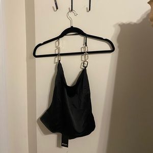 Brand new satin slinky crop top with silver detailing on the straps!